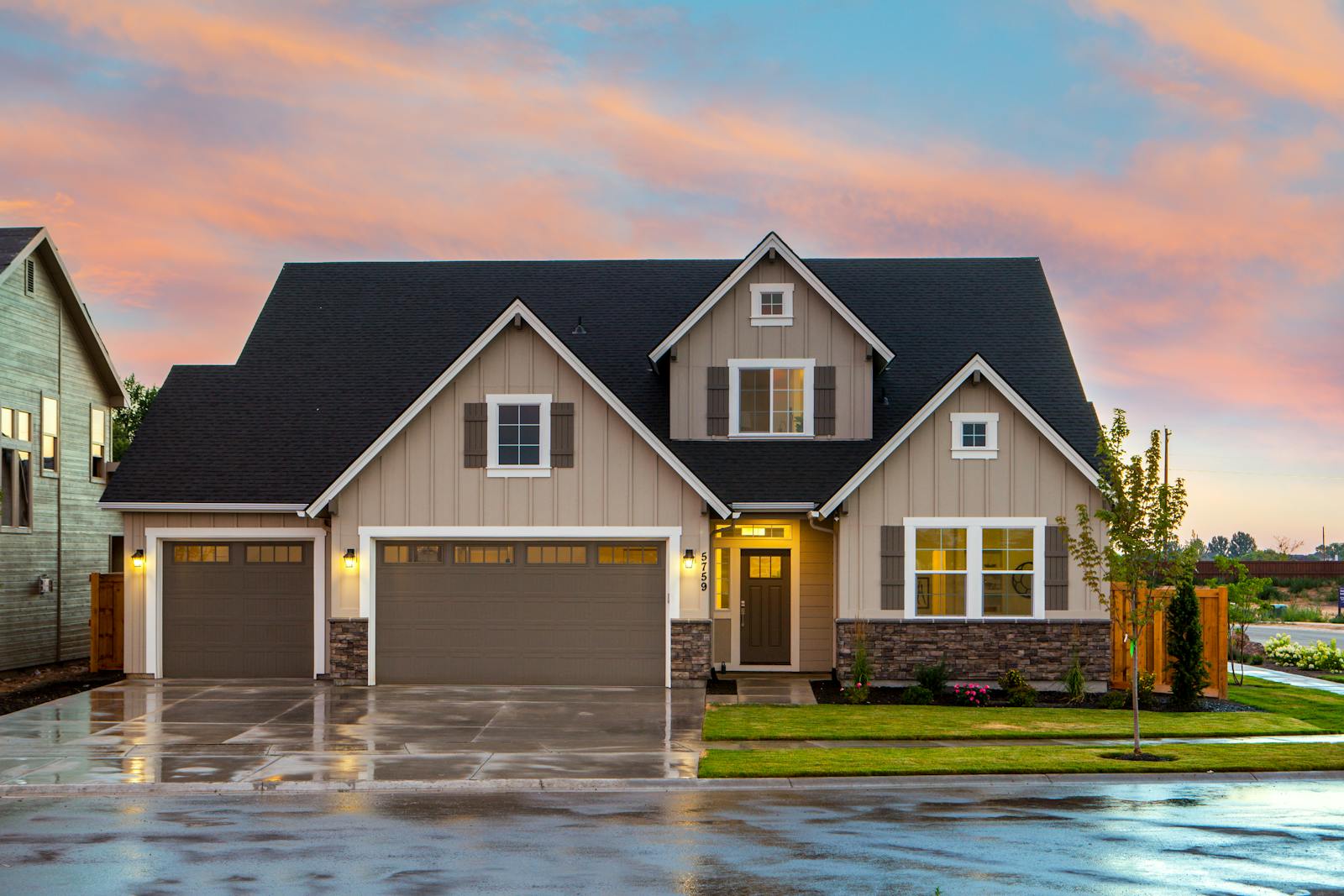 house insurance, Charming family home in Boise, ID with a modern facade and spacious garage.